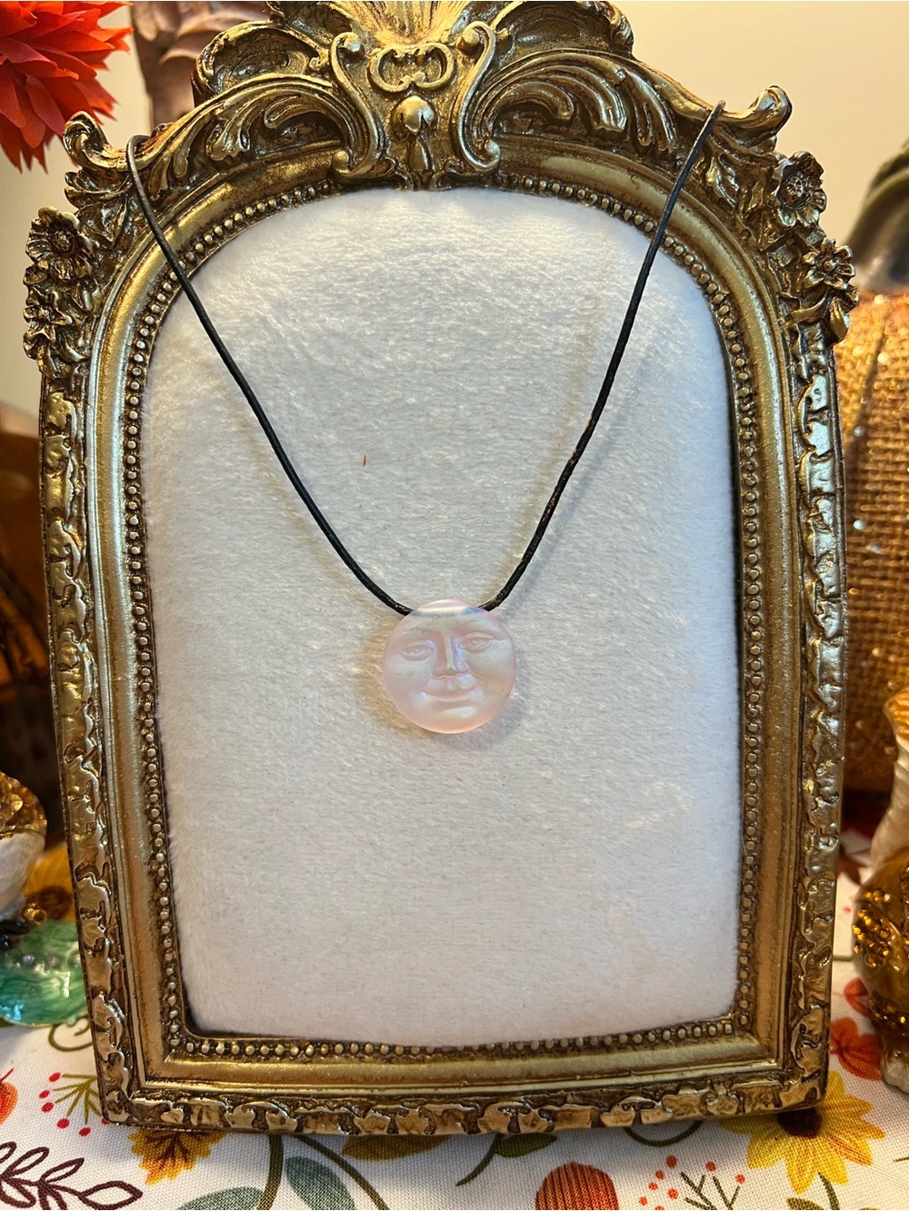 Kirks Folly Iridescent Pink Moon Face Pendant on Black Cord